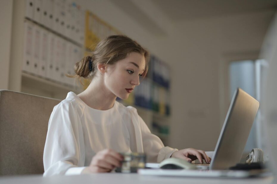 Female Accountant working using Laptop